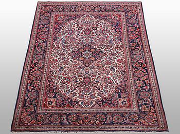 A rug, semi-antique Keshan, 217 x 134 cm.
