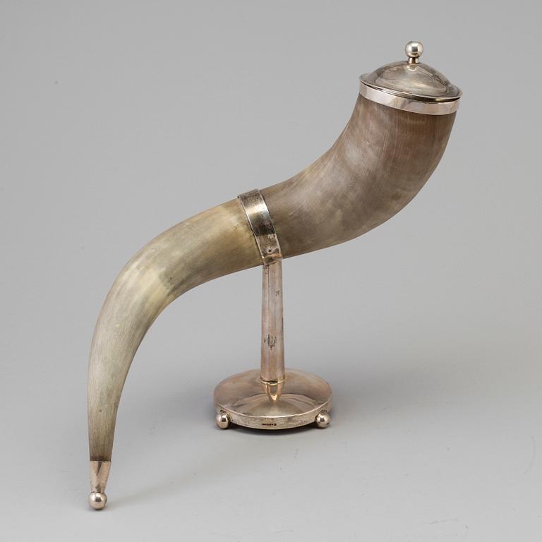 A drinking horn with silver mounts dated 1948.