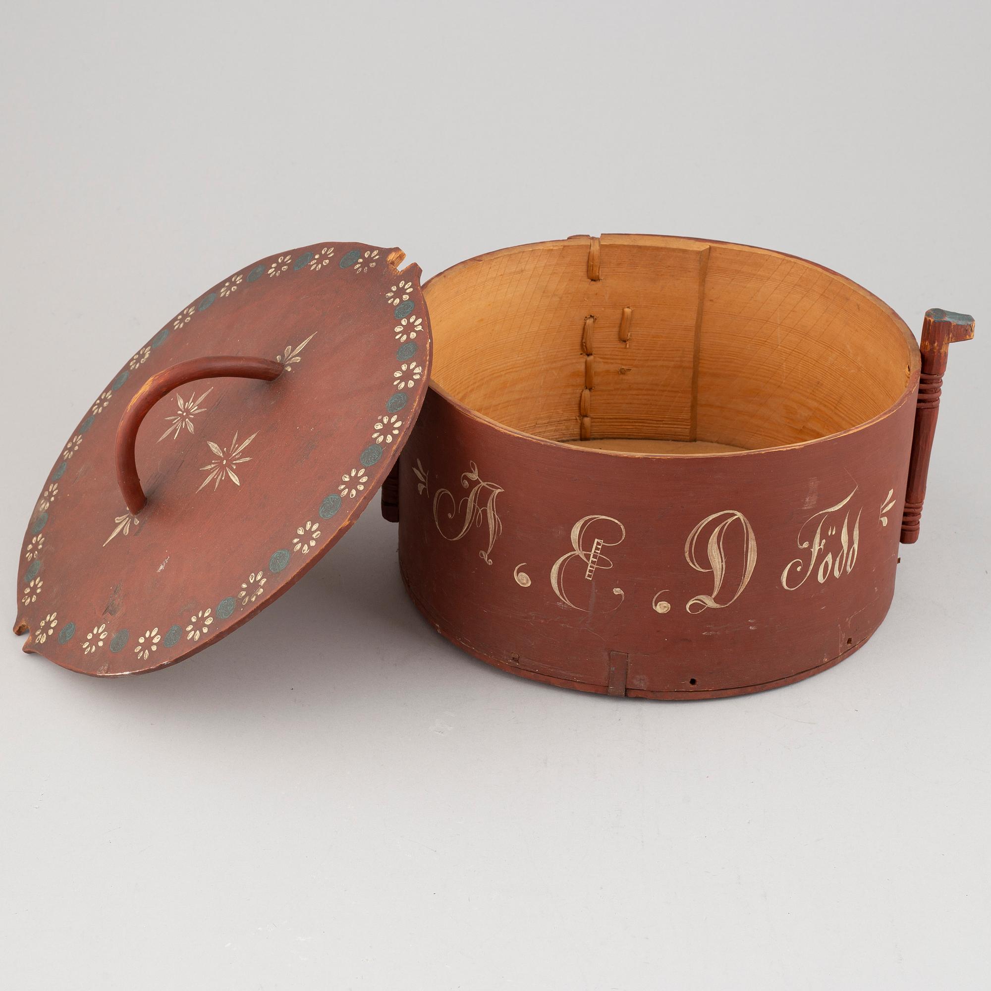 Stor svepask med lock, allmoge, 1800-talets andra hälft.