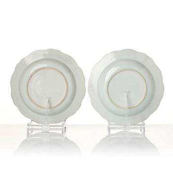 A group of famille rose 'double peacock' serving dishes, Qing dynasty, Qianlong (1736-95). (8 pieces).