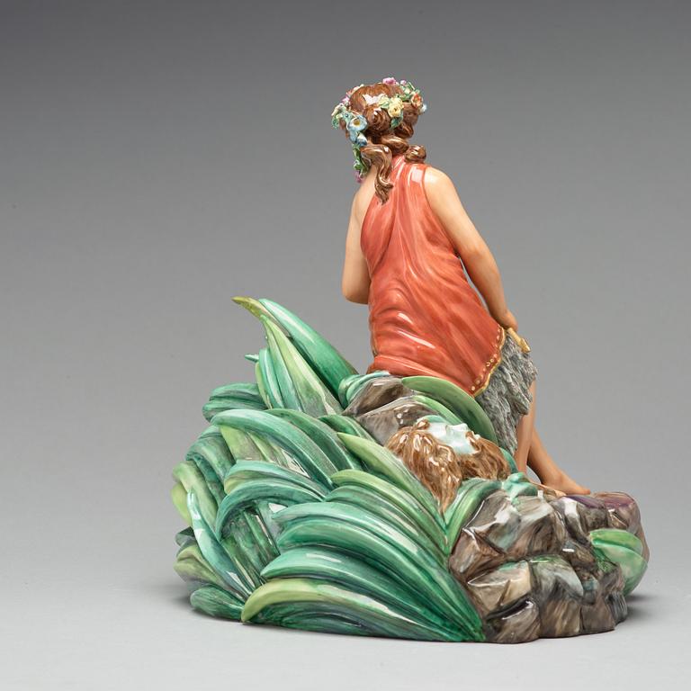 A Royal Copenhagen allegorical porcelain figure representing 'America', Denmark, 1920's.