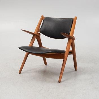 A Hans J. Wegner "CH28" armchair, Carl Hansen, Denmark, second half of the 20th century.