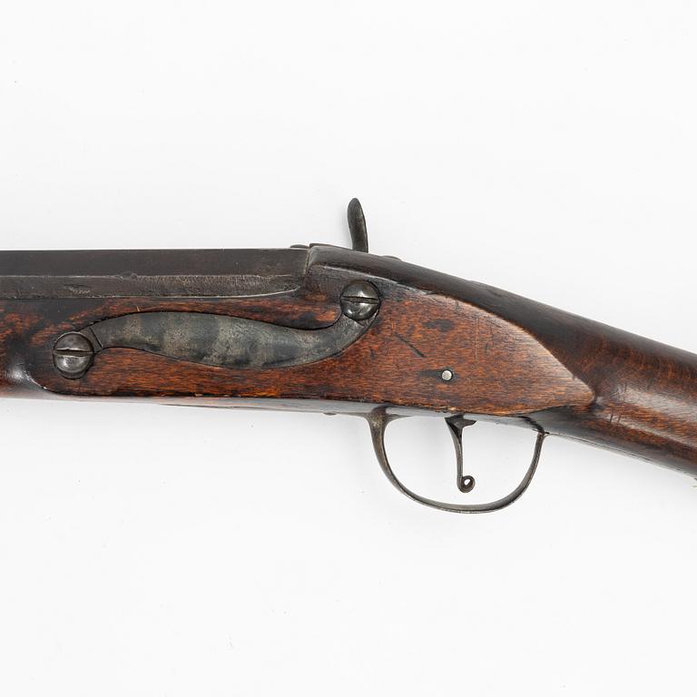 Percussion gun.