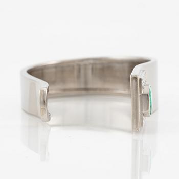 A Sigurd Persson bracelet 18K white gold with a faceted emerald and round brilliant-cut diamonds, Stockholm 1974.