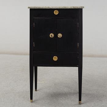 A 19th century gustavian style bedside table.