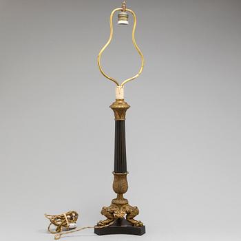 A LATE EMPIRE BRONZE TABLE LAMP, mid 19th century.