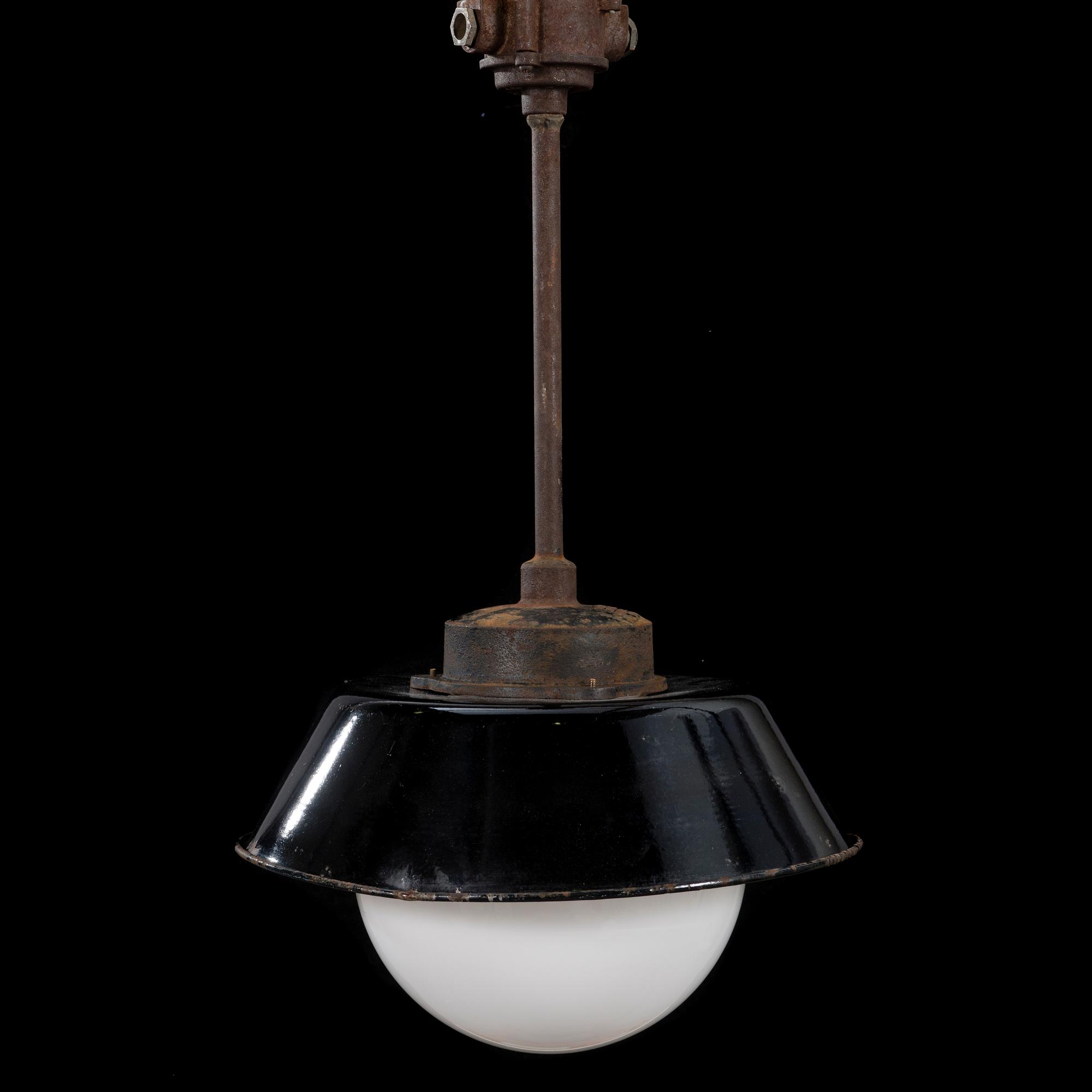 A industrial lamp by Paavo Tynell for Taito Oy, Finland.