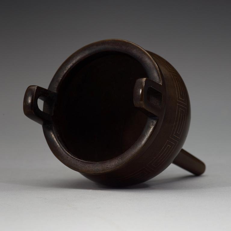 A bronze tripod censer, Qing dynasty, 19th Century with Xuandes six character mark.