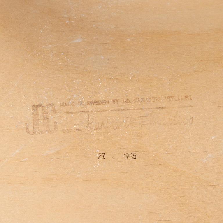 Four chairs by Karl-Erik Ekselius.