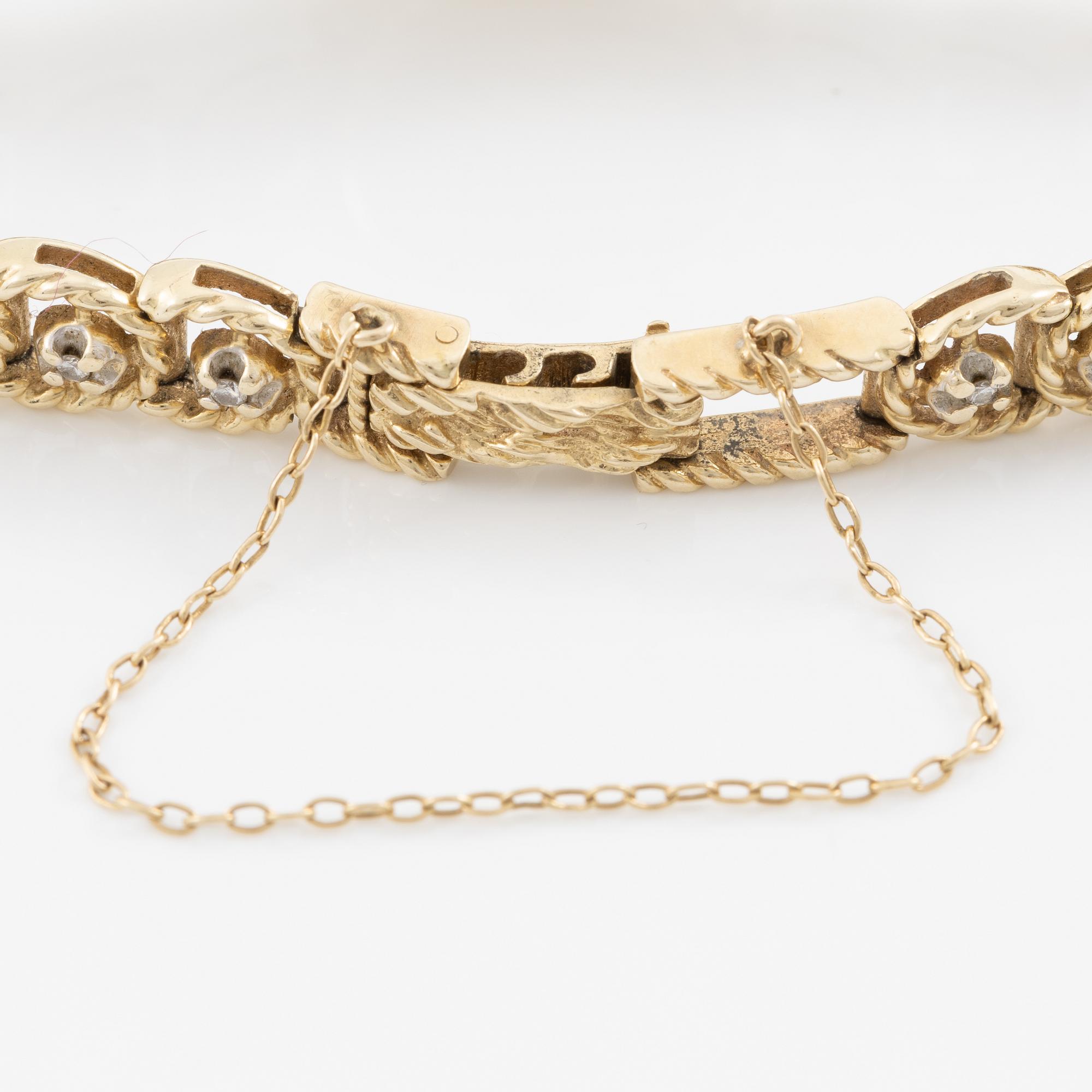 Wristwatch, Andre Pailet, 14K gold with brilliant-cut diamonds.