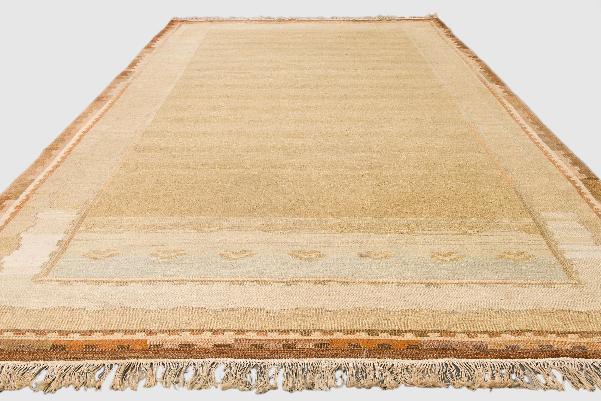 A 1930s Finnish functionalist syle flat weave carpet. Circa 332 x 600 cm.