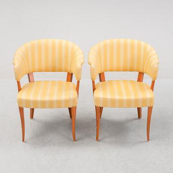 Carl Malmsten, a pair of 'Lata Greven' easy chairs, OH Sjögren, and a 'Berg' table, second half of the 20th Century.