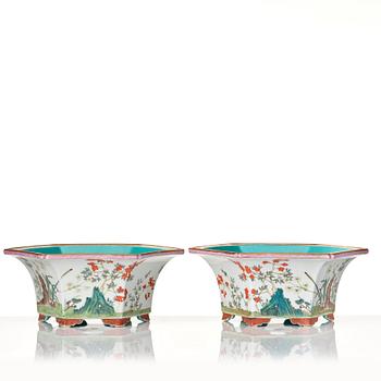 A pair of famille rose flower pots with stands, probably Republic, China, 20th Century.