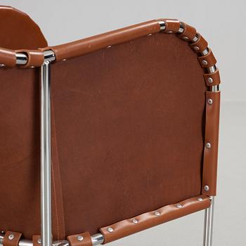 Mats Theselius, A pair of 'Bruno' brown leather and steel easy chairs, Källemo, Sweden.