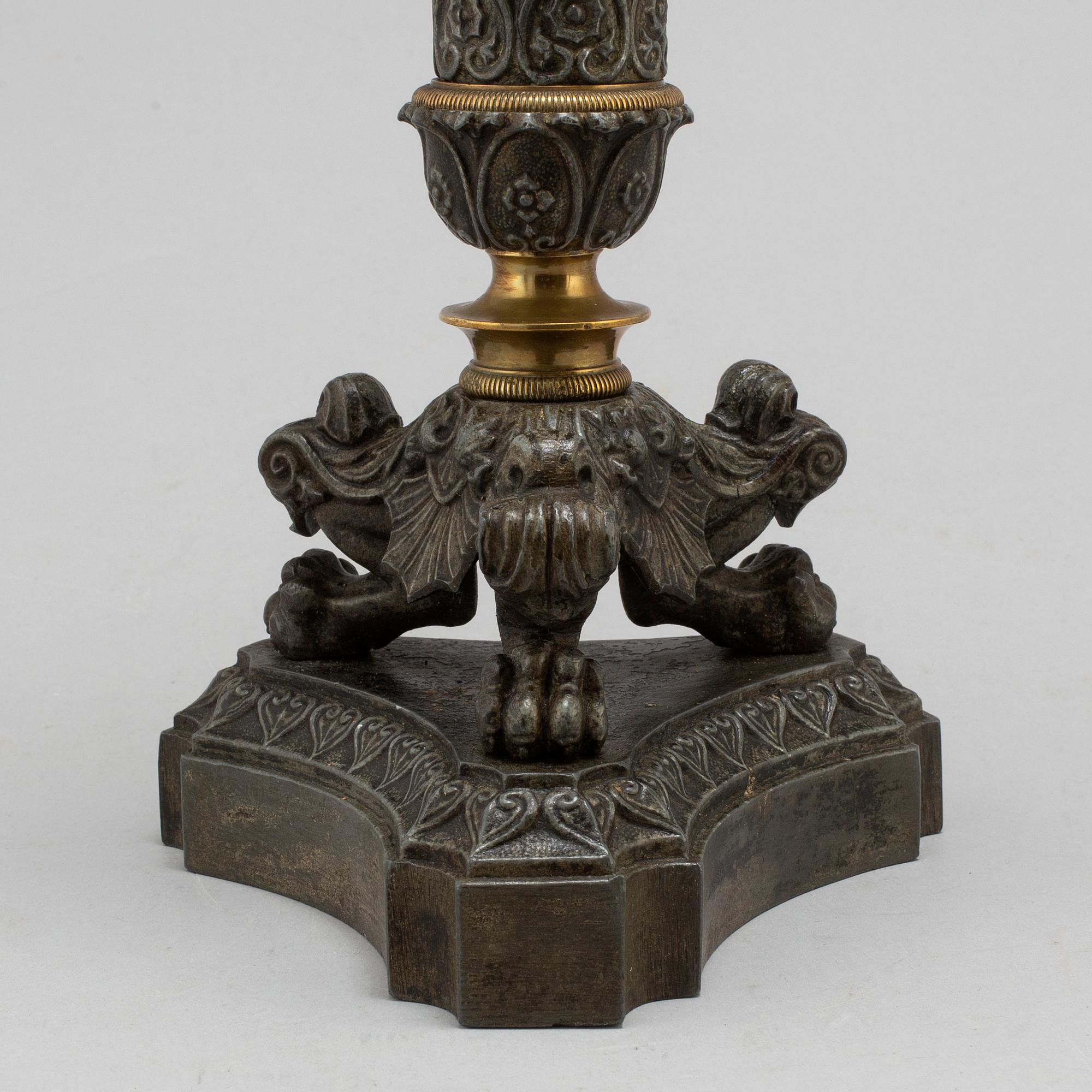 A mid 19th century late empire candlestick.