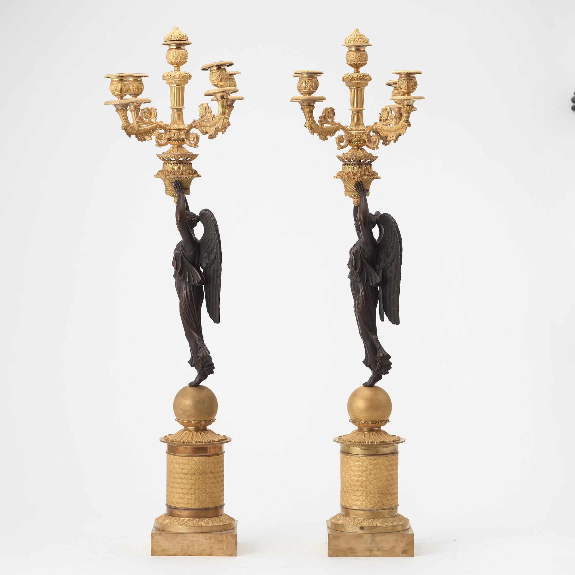 A pair of Empire early 19th century five-light candelabra by Pierre Chibout.