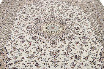 A Kashan carpet, c. 345 x 243 cm.