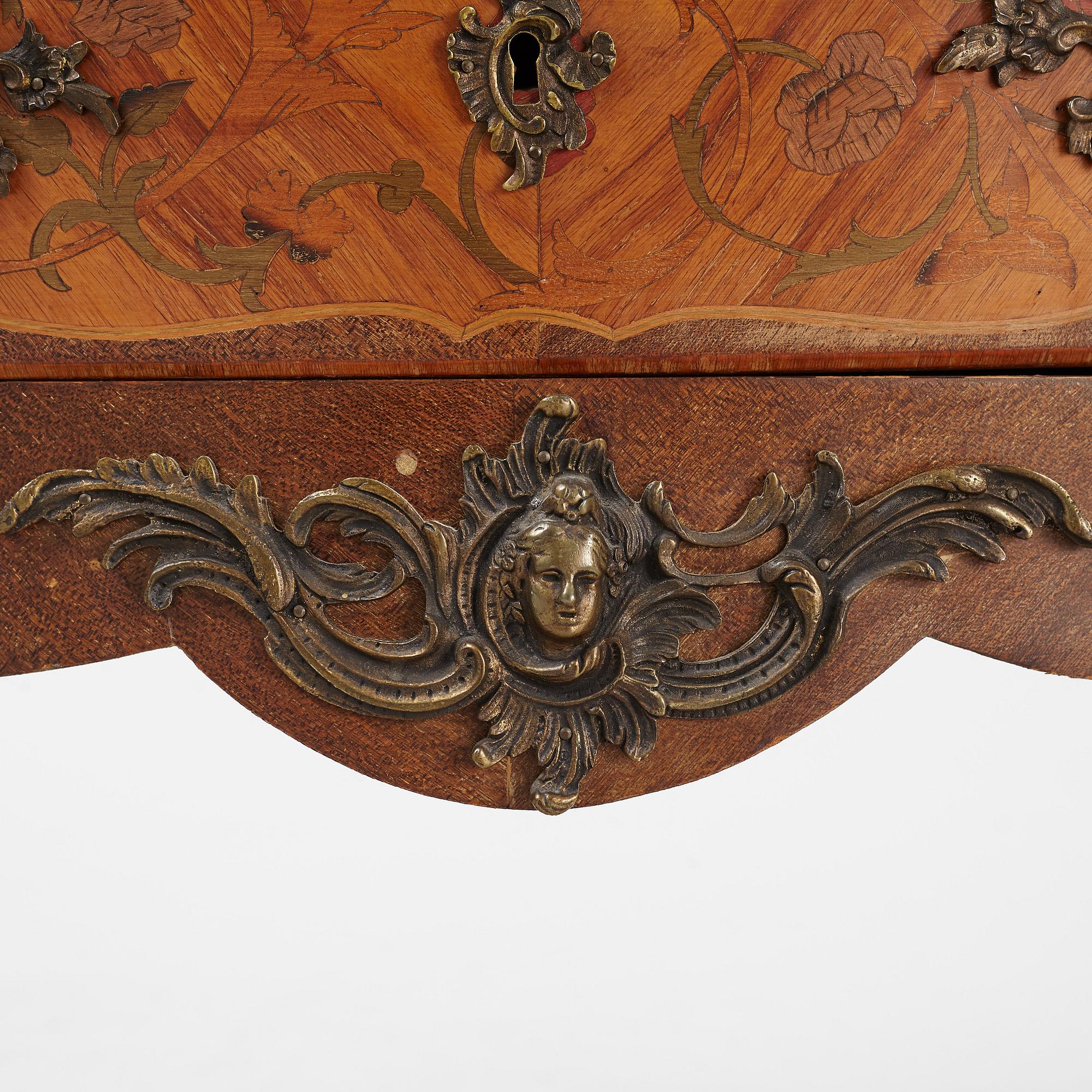 A Louis XV-style marquetry commode, first part of the 20th century.