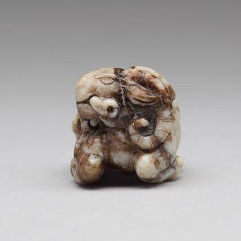 A carved nephrite figurine, late Ming dynasty (1368-1643).