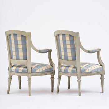 A pair of late Gustavian open armchairs by J. E. Höglander (master in Stockholm 1777-1813).