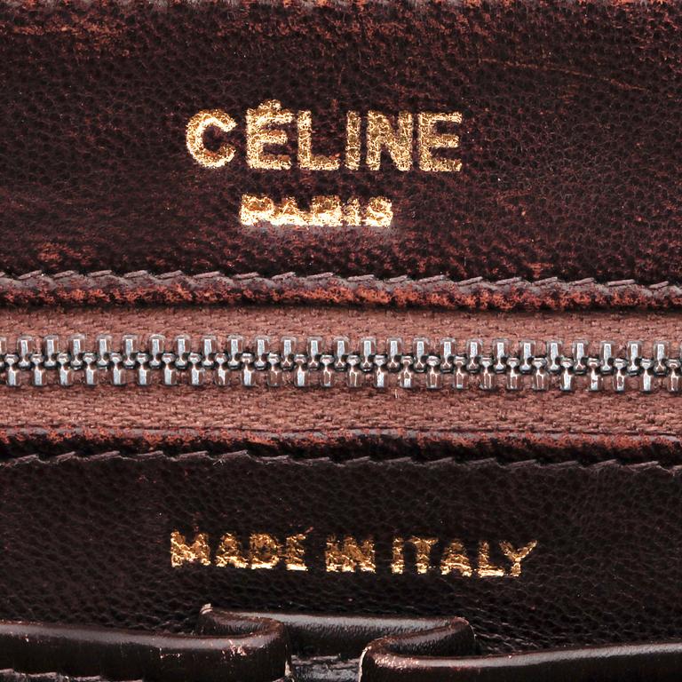 CÉLINE, a brown crocodile evening bag / shoulder bag with  shoulder strap.