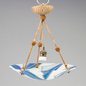 A second half of the 20th century art deco style ceiling light by Maxonade, France.