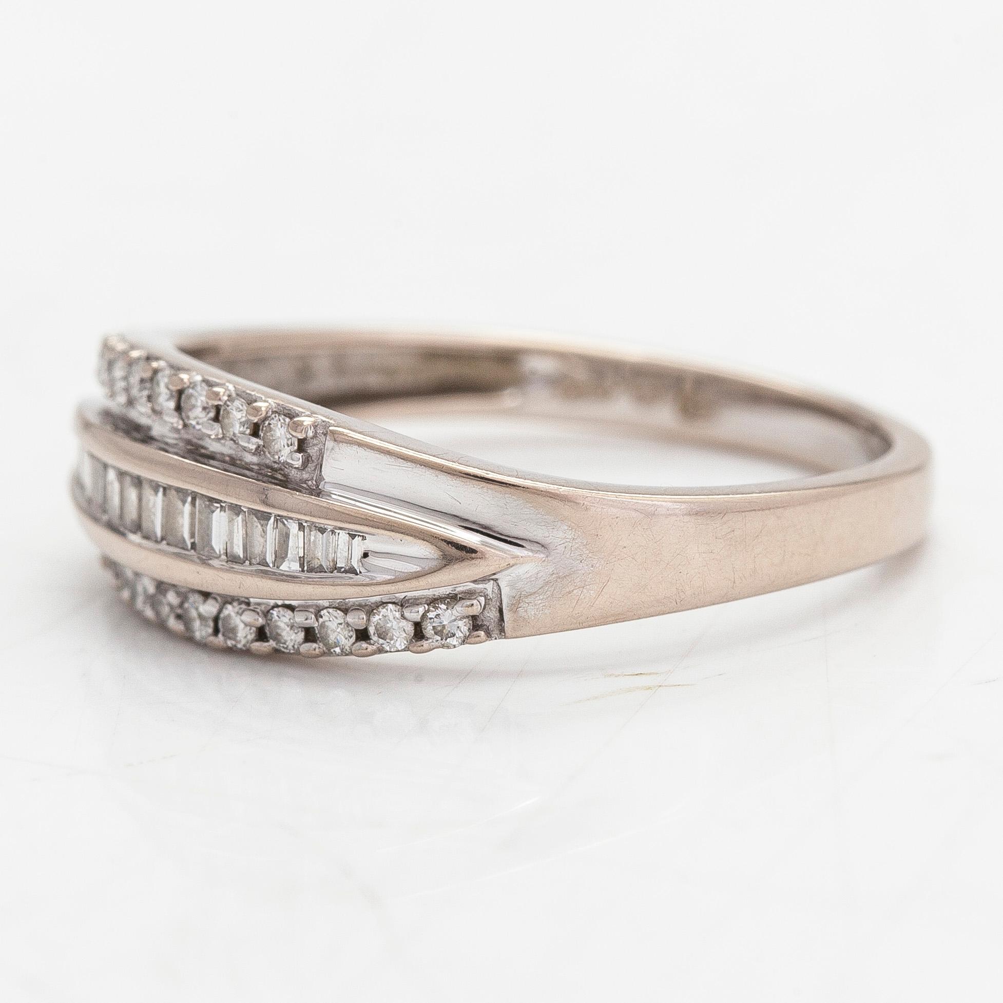 Ring, 14K vitguld och diamanter tot. ca 0,26 ct.  Kultakeskus, Tavastehus.