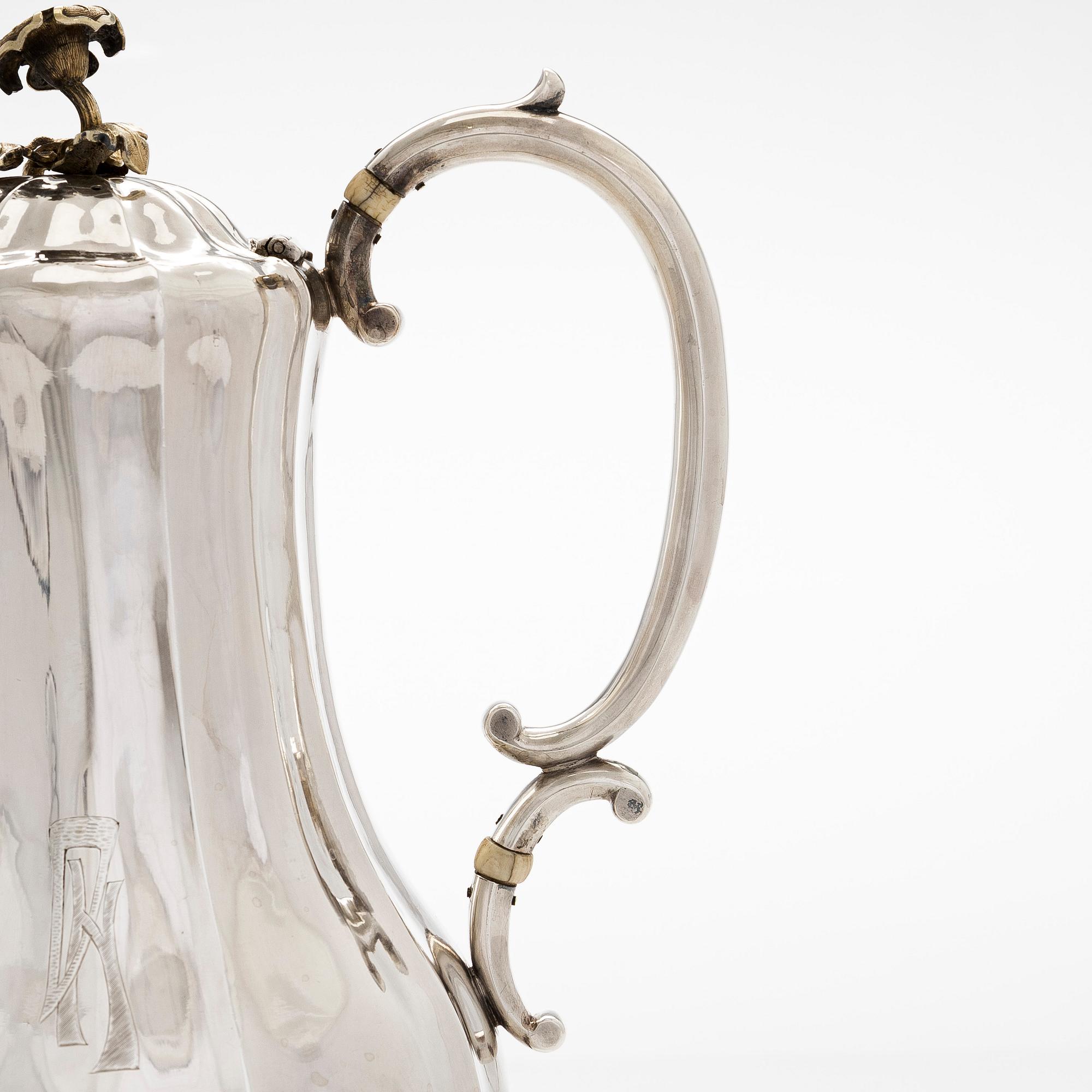 A parcel-gilt coffee pot, maker's mark of Johan Gustaf Ettinger, Vyborg 1861.