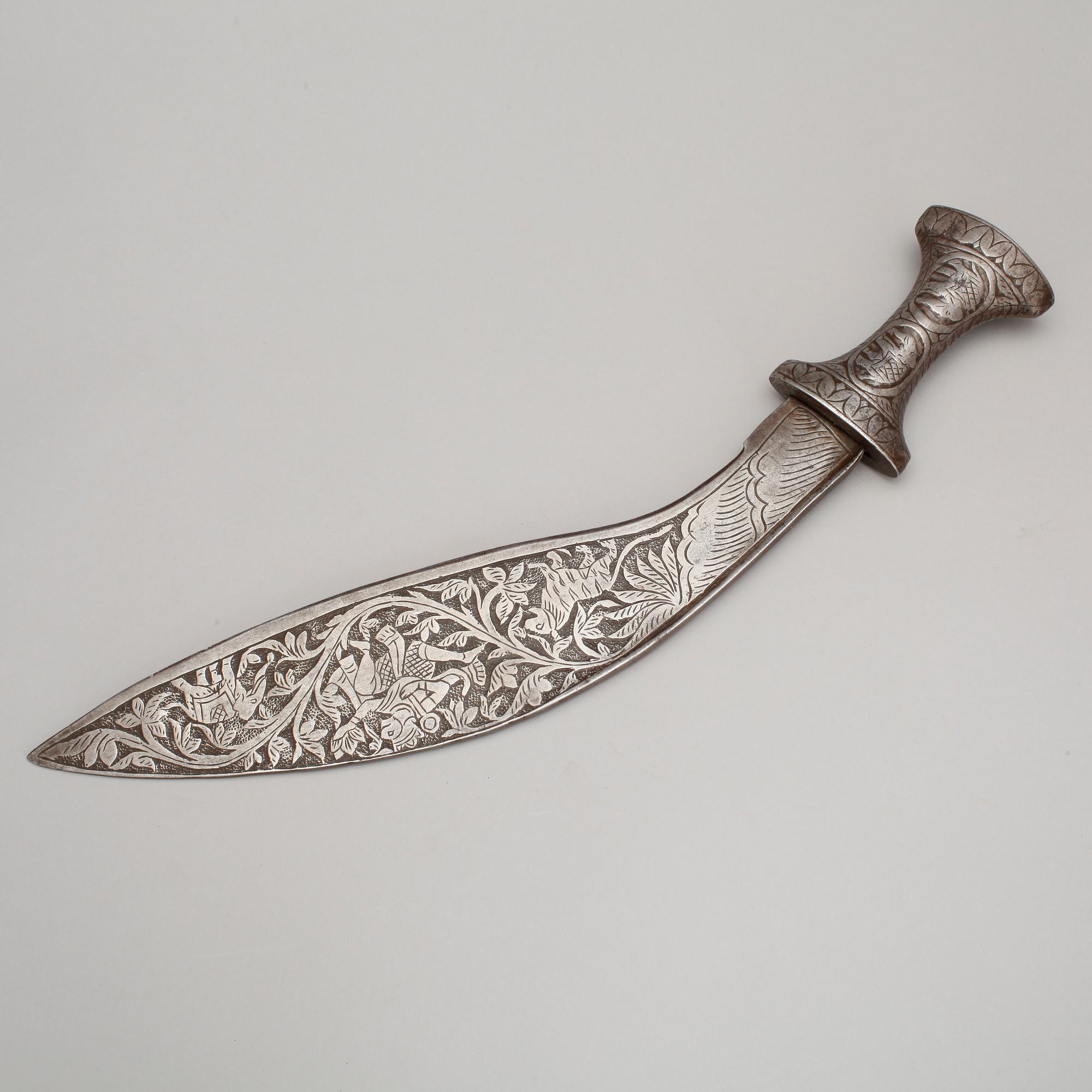 KUKRI samt YXA, indopersiska, stål, 1900-talets första hälft.