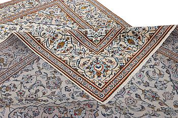 A Kashan carpet, c. 355 x 238 cm.