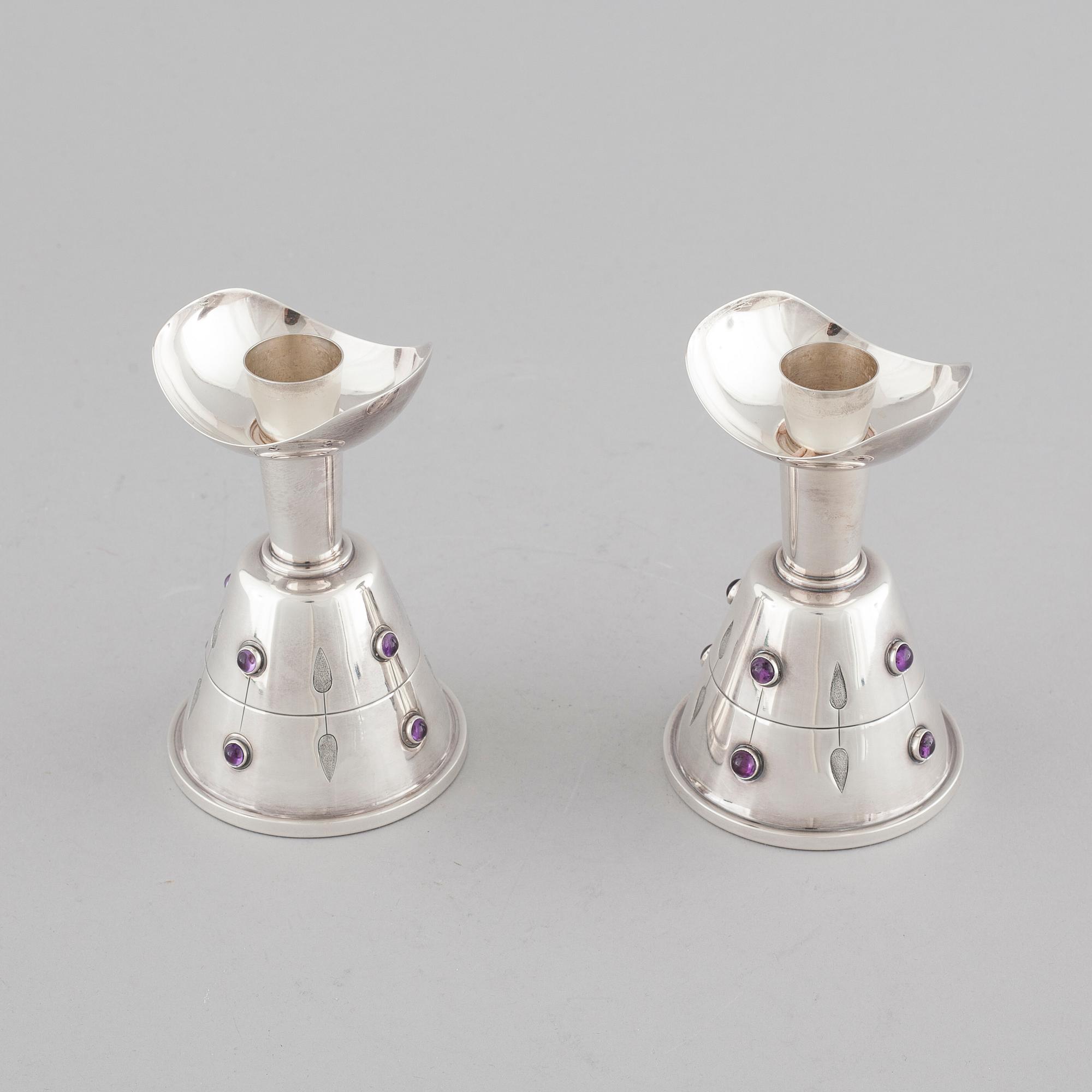 A pair of candleholders by Tage Göthlin in silver for Tesi, Gothenburg, year 1956. Weight in tot 580 gram.