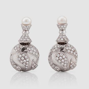 1394. A pair of diamond and cultured pearl earrings. Total carat weight of diamonds circa 2.50 cts.