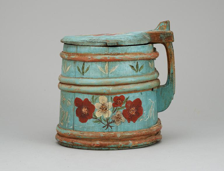 A Swedish wood jug, dated 1824.