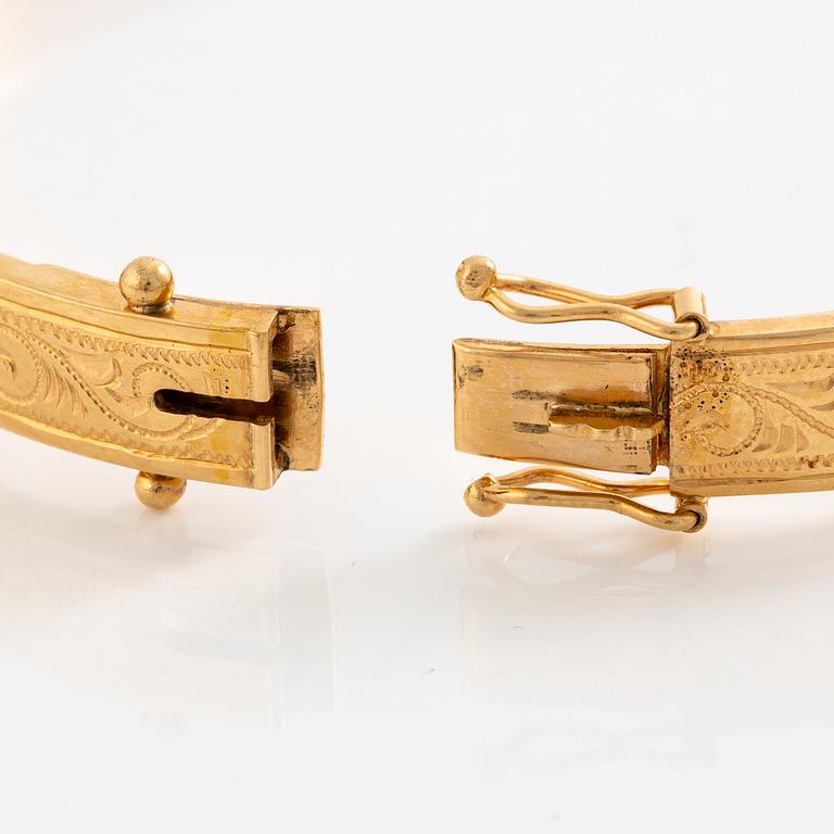 Arm ring, 18K gold.