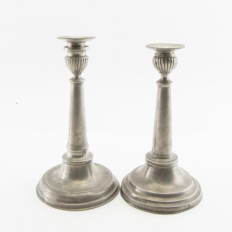 Candle holders, two pieces of pewter, 1850s.