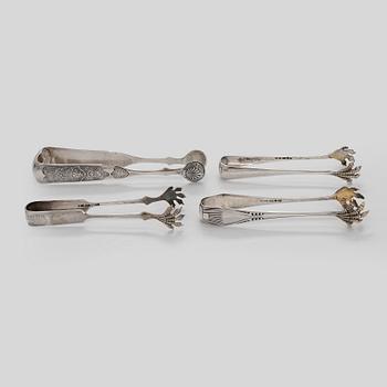 Servettringar 6 st och sockertångar 4 st, silver, olika stämplar 1893-1936.