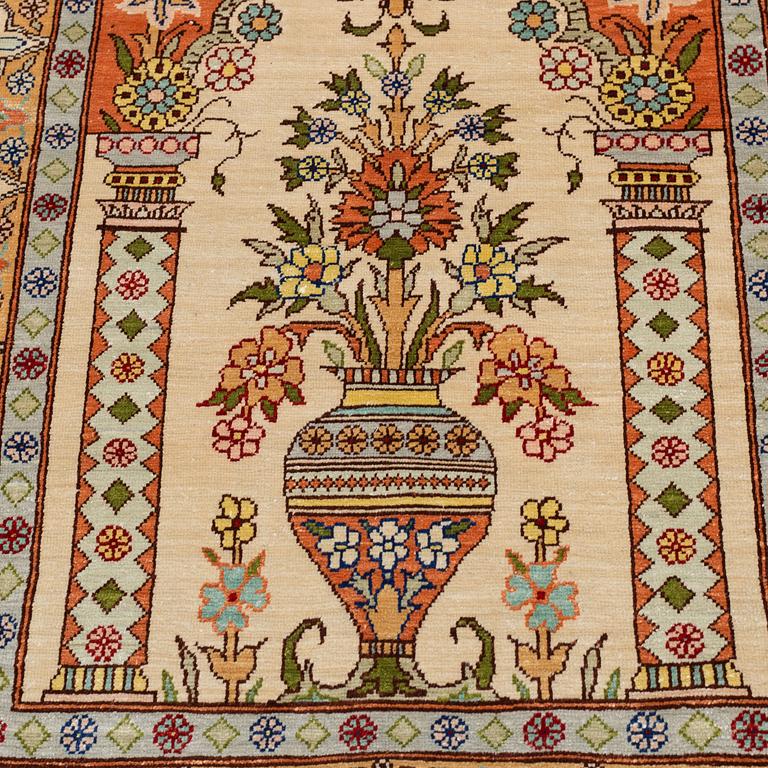 A RUG, Silk, Hereke, PROBABLY 82 x 54 cm.