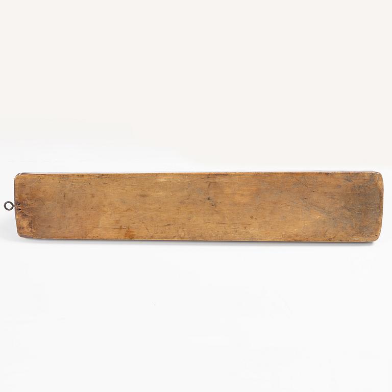 A carved and polychrome painted mangle board, Sweden, late 18th / early 19th century.