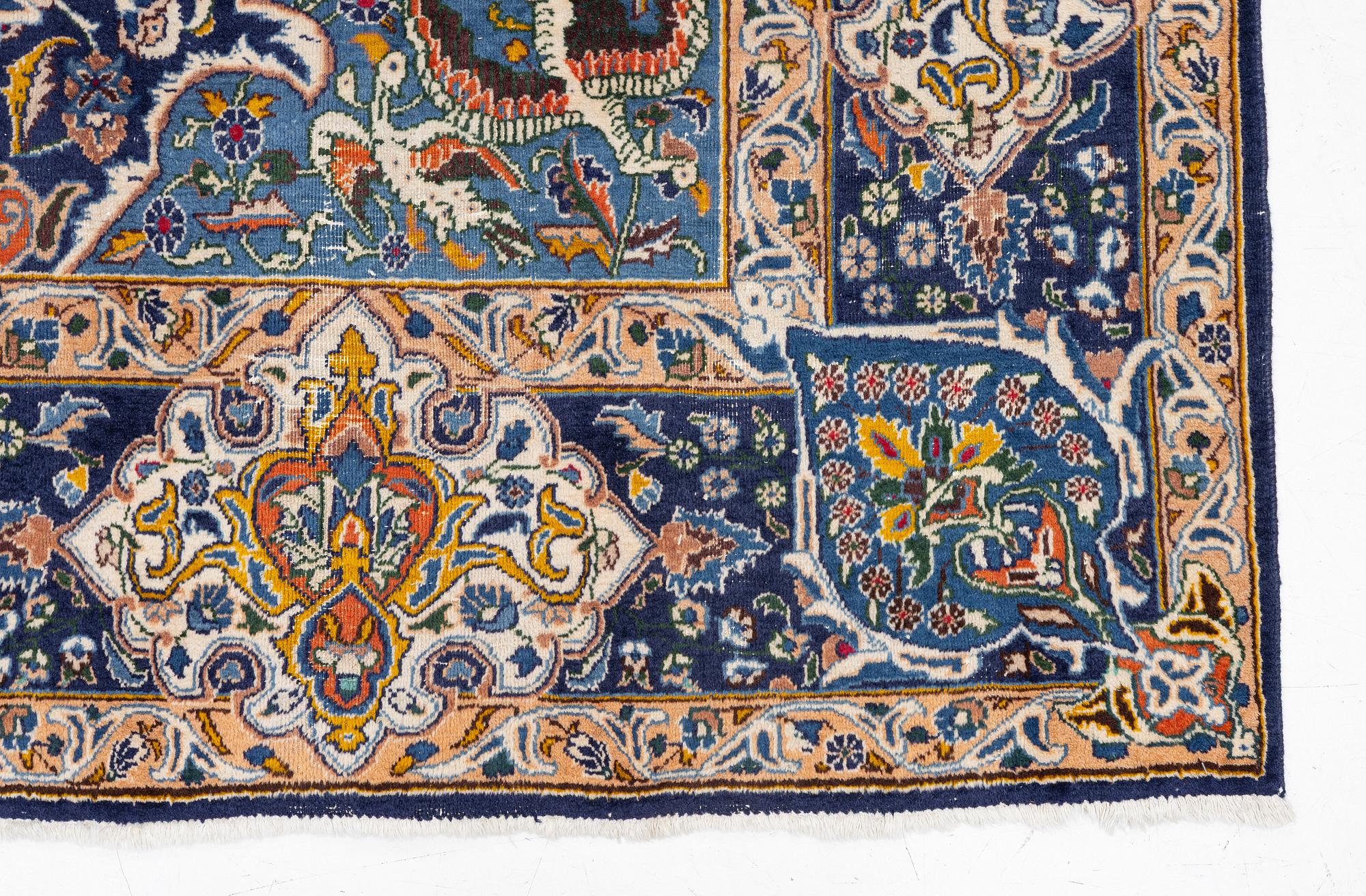 A Kashmar carpet, c. 335 x 242 cm.