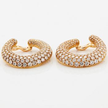 Cartier a pair of hoop earrings.