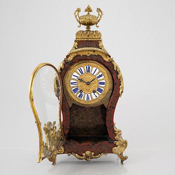 A Louis-XV style mantle clock, France, 19th century.