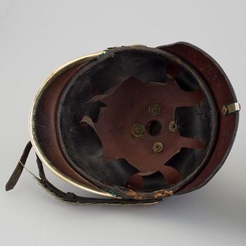 Two 19th century helmets.