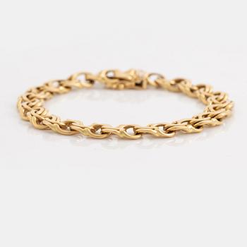 18K gold bracelet.