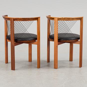 a pair of mahogany armchairs designed by Niels Jörgen Haugesen, made by Tranekaer Furniture, Denmark. 1995.