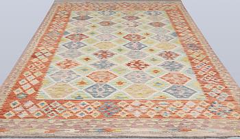 A Kilim carpet, approx. 309 x 203 cm.