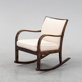 A 1930's stained birch rocking chair from Knolls Moderna Fåtöljer, 1930's.