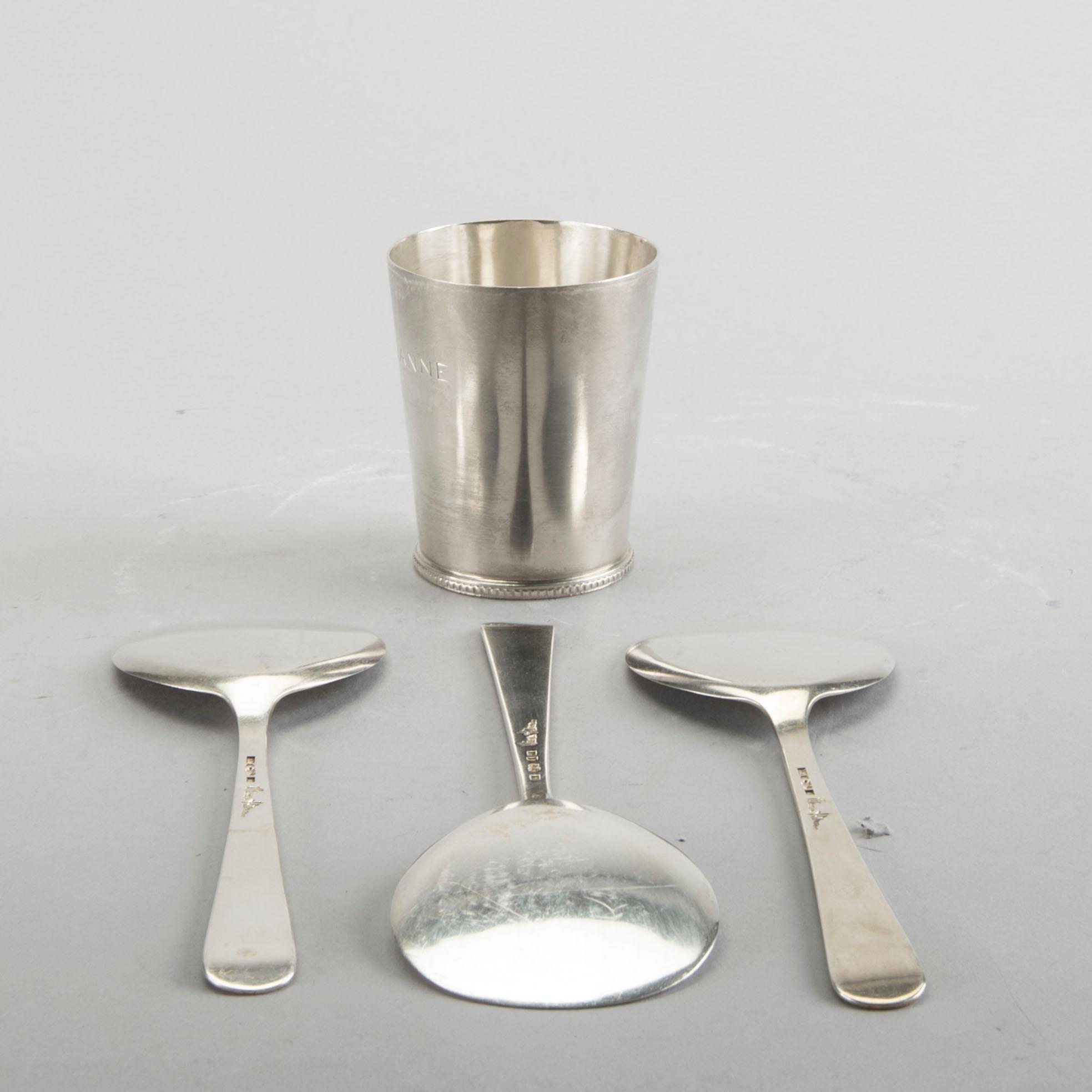 A Swedish 20th century sterling set of three sandwich spoons ad a beaker mark of W Nilsson Lund 1965, 1967 and 1946,