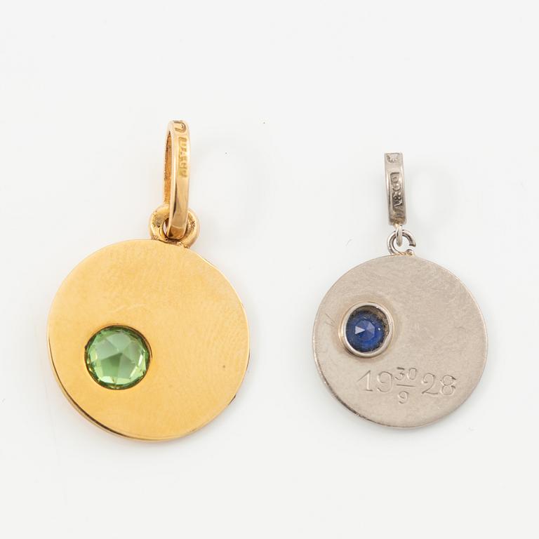 Two pendants in 18K gold and white gold.