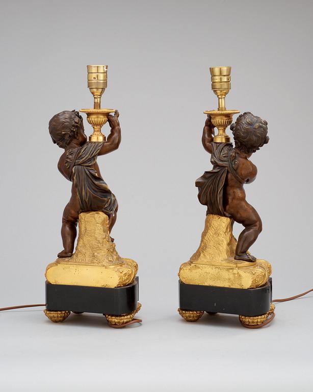 A pair of Louis XVI-style circa 1900 table lamps.