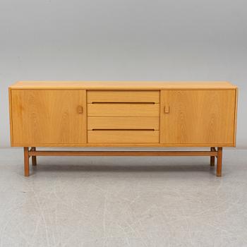 A second half of the 20th century oak veneered 'Arild' sideboard by Nils Jonsson, Troeds, Sweden.